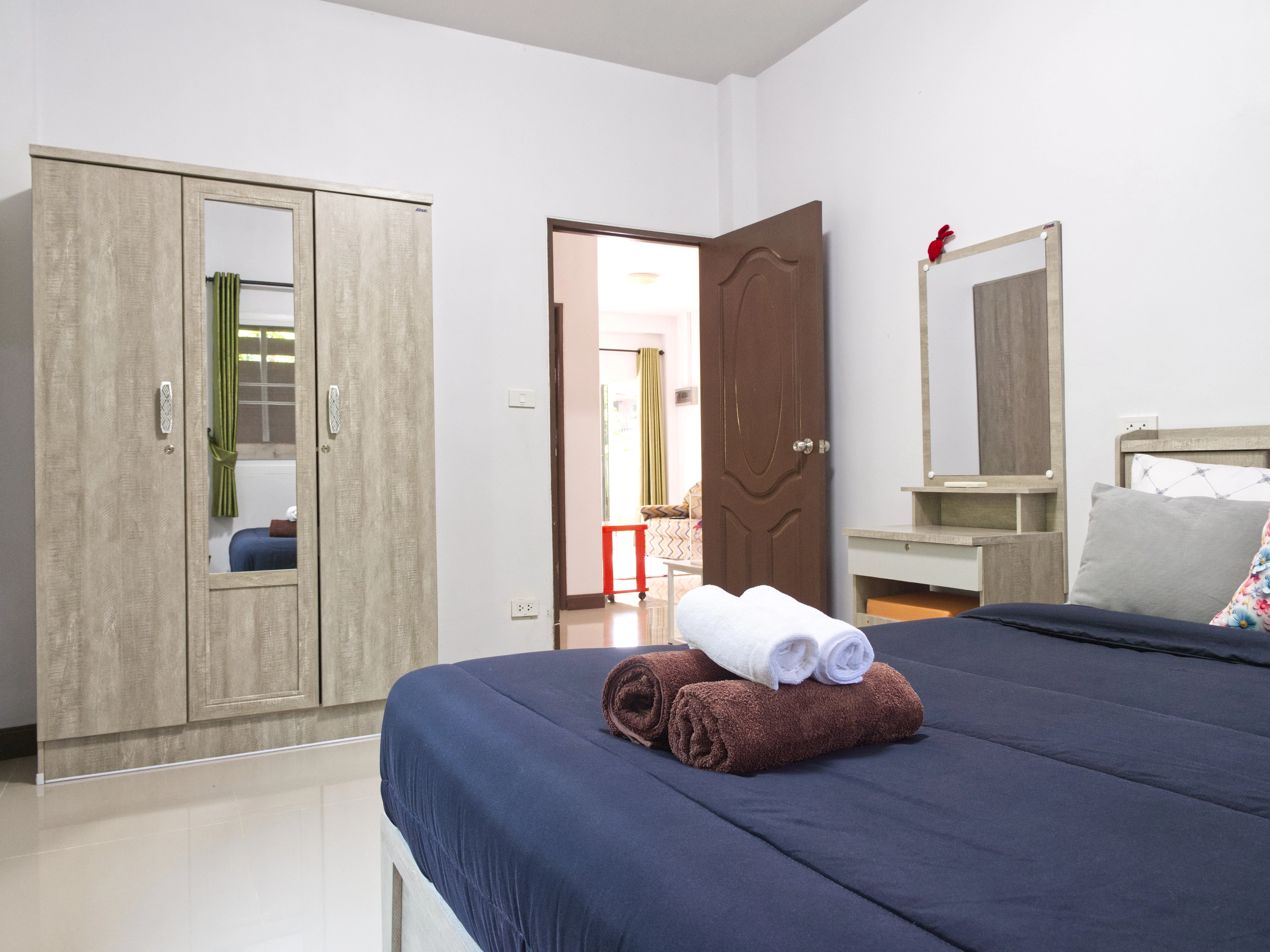 Stylish Krabi holiday rental bedroom with abstract art and vanity