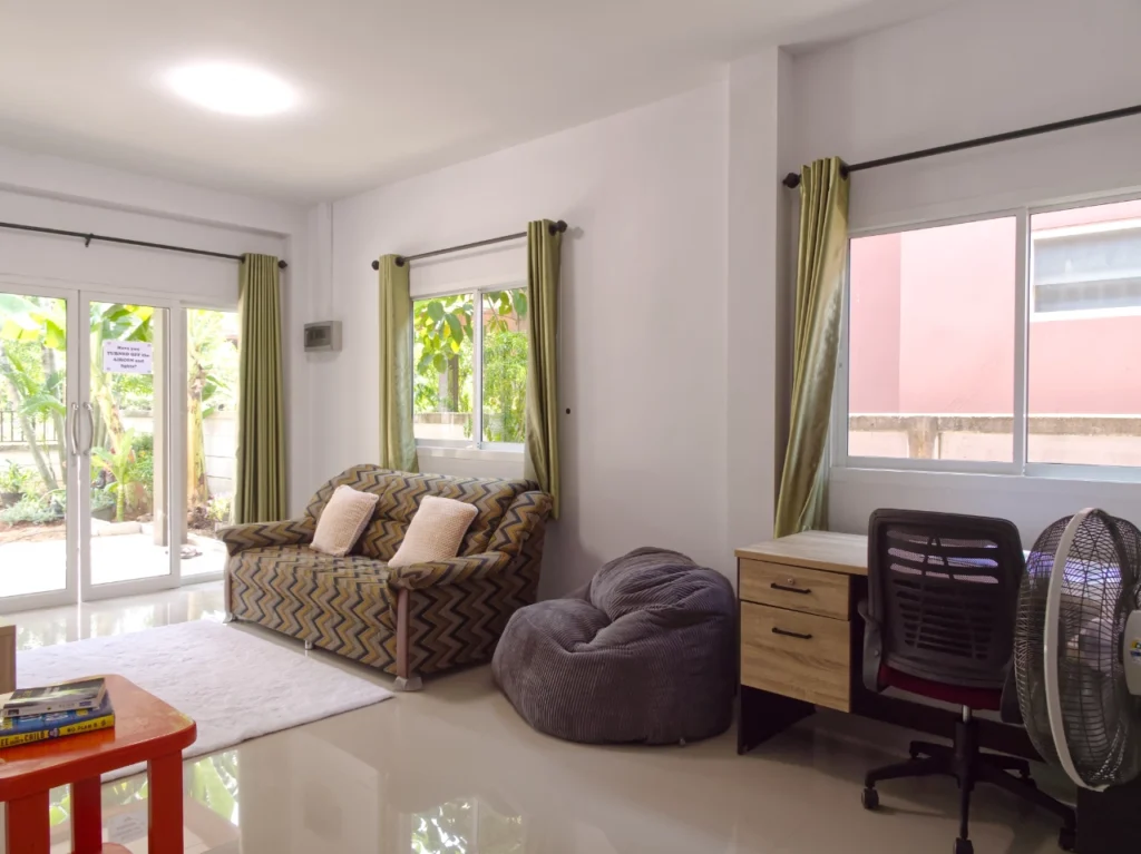 Bright Krabi rental home living room with patio view