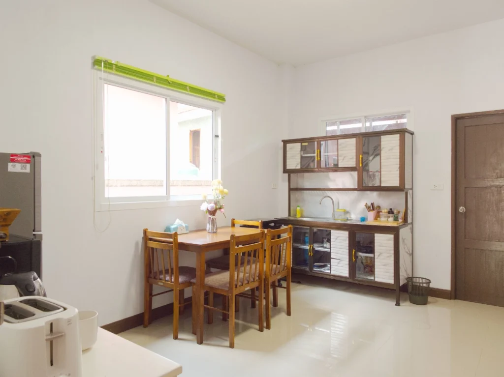 Dining space with kitchen appliances in Krabi holiday house